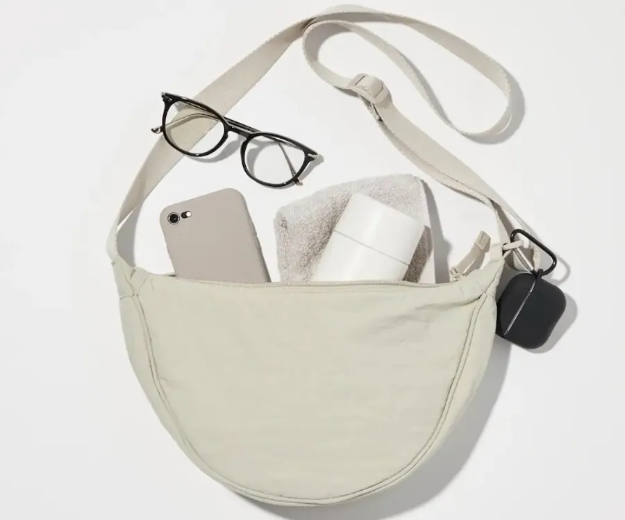 <p>Move over luxury handbags, there’s a new fashion must-have in town, and it’s not breaking the bank. Uniqlo’s unassuming £14.90 mini-round shoulder bag, affectionately nicknamed the “banana bag” for its curved silhouette, has taken the internet by storm, propelling it to become the retailer’s best-selling bag ever.</p>